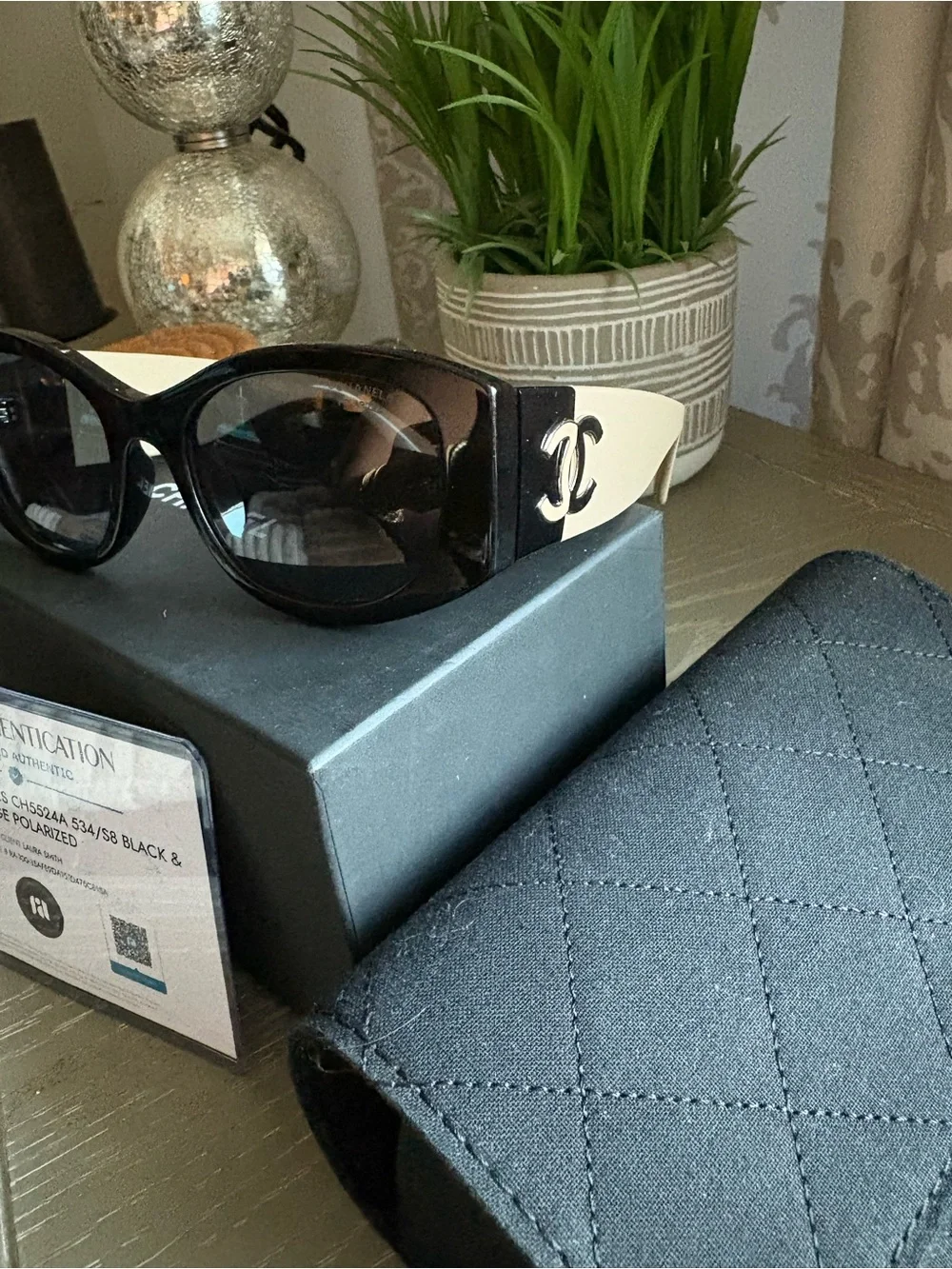 CHANEL Oval Polarized Black Sunglasses with Beige Inner Accents